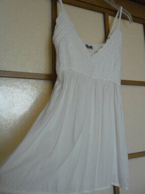 Earthbound Trading Co. White Floaty Top. Made in India. Part cotton. Small size.